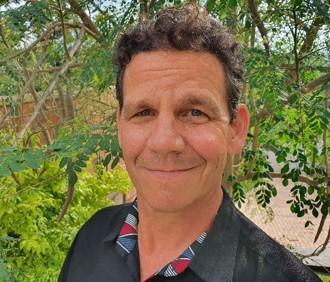 headshot of nelson cronyn keynote speaker